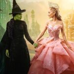 Wicked movie poster featuring Cynthia Erivo (Elphaba) and Ariana Grande (Glinda).