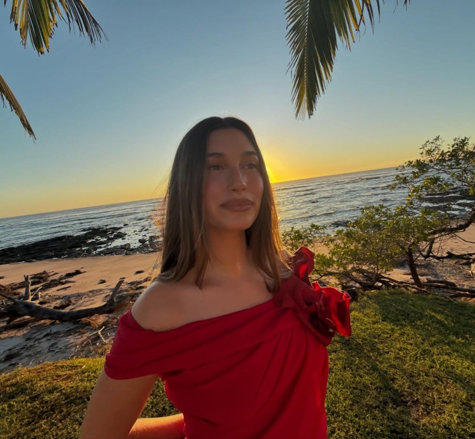 Hailey looked gorgeous in a red dress while on their vacation