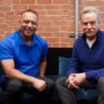 Dodgers manager Dave Roberts, left, and actor Bryan Cranston.