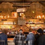 People seated at the bar at Pappy & Harriet's in Pioneertown.