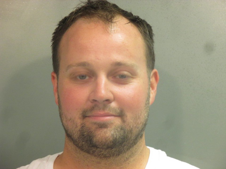 Josh Duggar smirked in his mugshot in April 2021, after he was arrested and charged with possessing and receiving child pornography