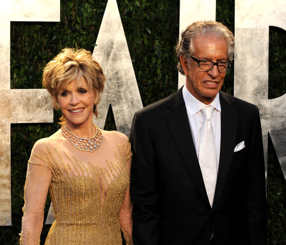 Actress Jane Fonda and Richard Perry arrive at the 2012 Vanity Fair Oscar Party in California