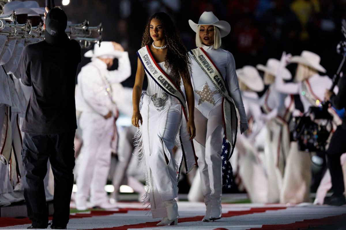 HOUSTON, TEXAS - DECEMBER 25: Blue Ivy walks onto the field for the BeyoncÃ© halftime show during an NFL football game between the Baltimore Ravens and the Houston Texans, at NRG Stadium on December 25, 2024 in Houston, Texas. (Photo by Brooke Sutton/Getty Images)