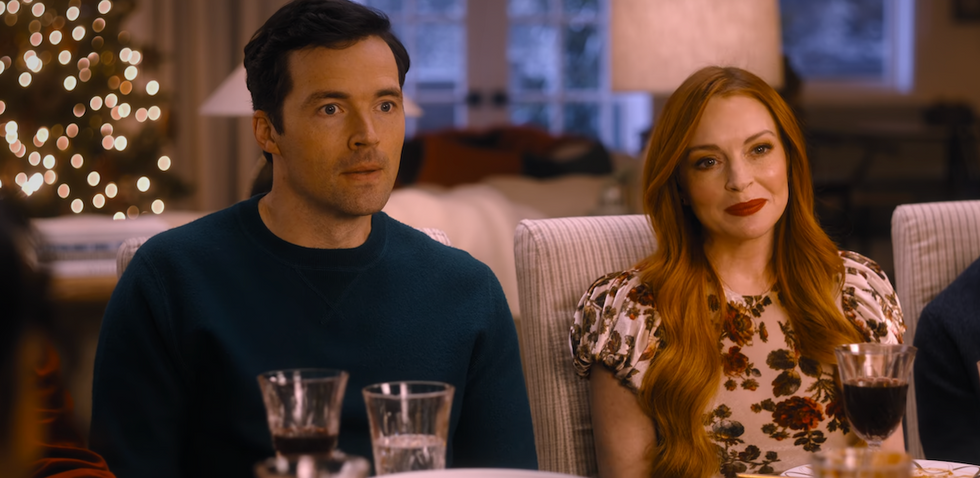 Actors Ian Harding and Lindsay Lohan in a still from the Netflix movie Our Little Secret