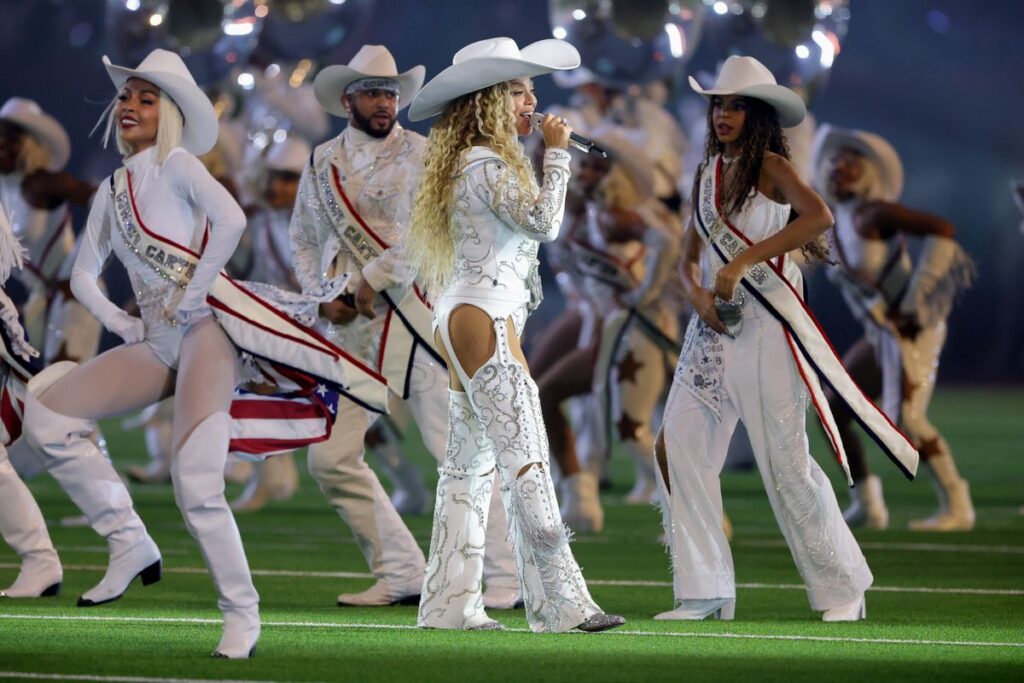 HOUSTON, TEXAS - DECEMBER 25: BeyoncÃ© and Blue Ivy perform during the halftime show for the game between the Baltimore Ravens and the Houston Texans at NRG Stadium on December 25, 2024 in Houston, Texas. (Photo by Alex Slitz/Getty Images)