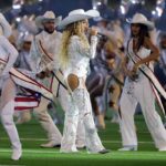 HOUSTON, TEXAS - DECEMBER 25: BeyoncÃ© and Blue Ivy perform during the halftime show for the game between the Baltimore Ravens and the Houston Texans at NRG Stadium on December 25, 2024 in Houston, Texas. (Photo by Alex Slitz/Getty Images)