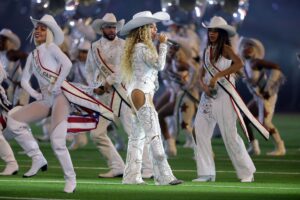 HOUSTON, TEXAS - DECEMBER 25: BeyoncÃ© and Blue Ivy perform during the halftime show for the game between the Baltimore Ravens and the Houston Texans at NRG Stadium on December 25, 2024 in Houston, Texas. (Photo by Alex Slitz/Getty Images)