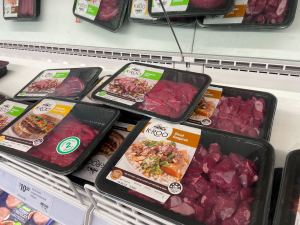 Various packages of kangaroo meat lie on a supermarket shelf. Australian kangaroos are hunted for their meat and leather.