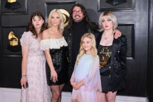 Dave Grohl and Jordyn Blum seen with their daughters Violet, Ophelia and Harper at the 65th Annual GRAMMY Awards in 2023