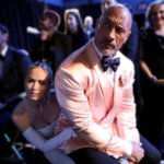 the rock sitting on emily blunts lap