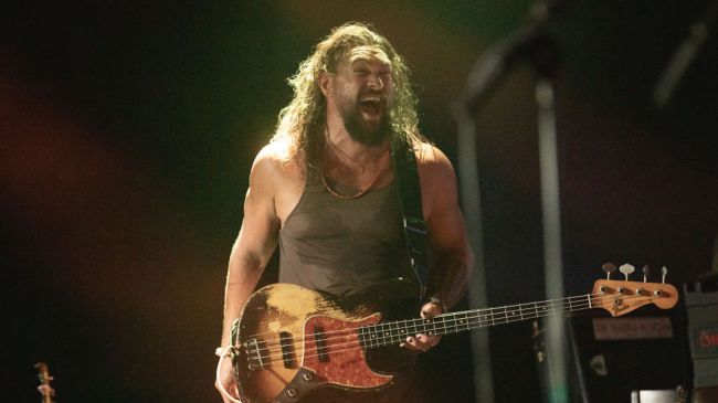 jason momoa playing guitar