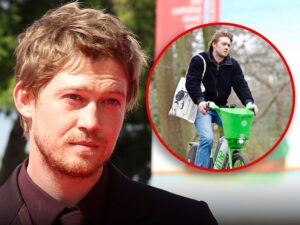 Joe Alwyn Looks Downcast Riding Bike Day After Christmas in London