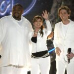 Kelly Clarkson, center, appeared on the Season 2 finale of "American Idol" alongside that year's winner, Ruben Studdard, and runner-up Clay Aiken.