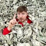 MrBeast surrounded by money