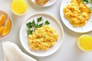 Healthy,Diet,Breakfast,Concept.,Scrambled,Eggs,And,Orange,Juice,Over