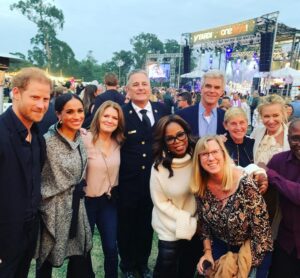 Prince Harry and Meghan Markle pose for a star-studded group photo with Oprah Winfrey, Ellen DeGeneres and Portia de Rossi at the One805 Live event on September 22.