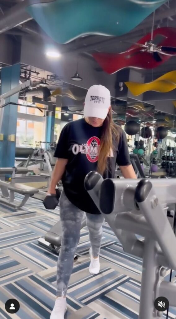 Ms. Olympia Competitor Oksana Grishina in Two-Piece Workout Gear Says "Work Hard, Be Kind"