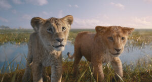 Two lion cubs emerging from a river in Disney’s Lion King prequel Mufasa