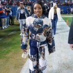 Simone Biles attended Thursday's Seattle Seahawks vs. Chicago Bears game in an outfit splashed with images of her husband, Bears safety Jonathan Owens.