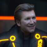 CLU aka digital Jeff Bridges smiles wide in Tron: Legacy