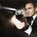 Daniel Craig poses as James Bond.  Craig was unveiled as legendary British secret agent James Bond 007 in the 21st Bond film Casino Royale, at HMS President, St Katharine's Way on October 14, 2005 in London, England.  (Photo by Greg Williams/Eon Productions via Getty Images)