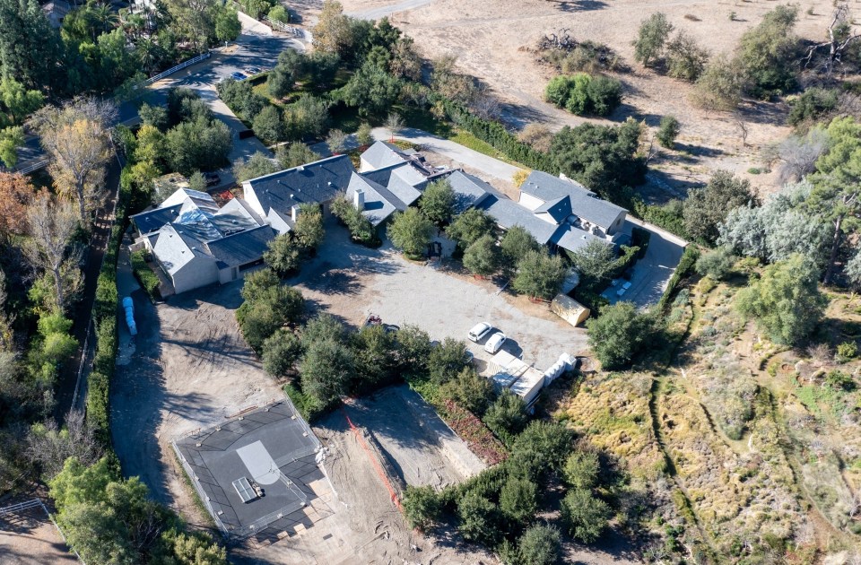 Workers have been stationed at the sprawling six-acre estate in Hidden Hills