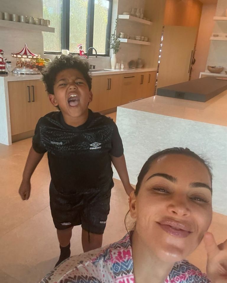 Saint appeared to be throwing a tantrum as Kim snapped a selfie