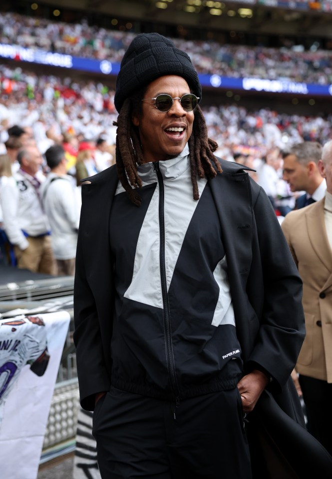 Jay-Z walks around the pitch ahead of the UEFA Champions League 2023/24 final match