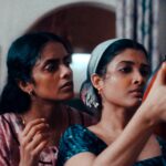 Two women look at a rice cooker in "All We Imagine as Light."