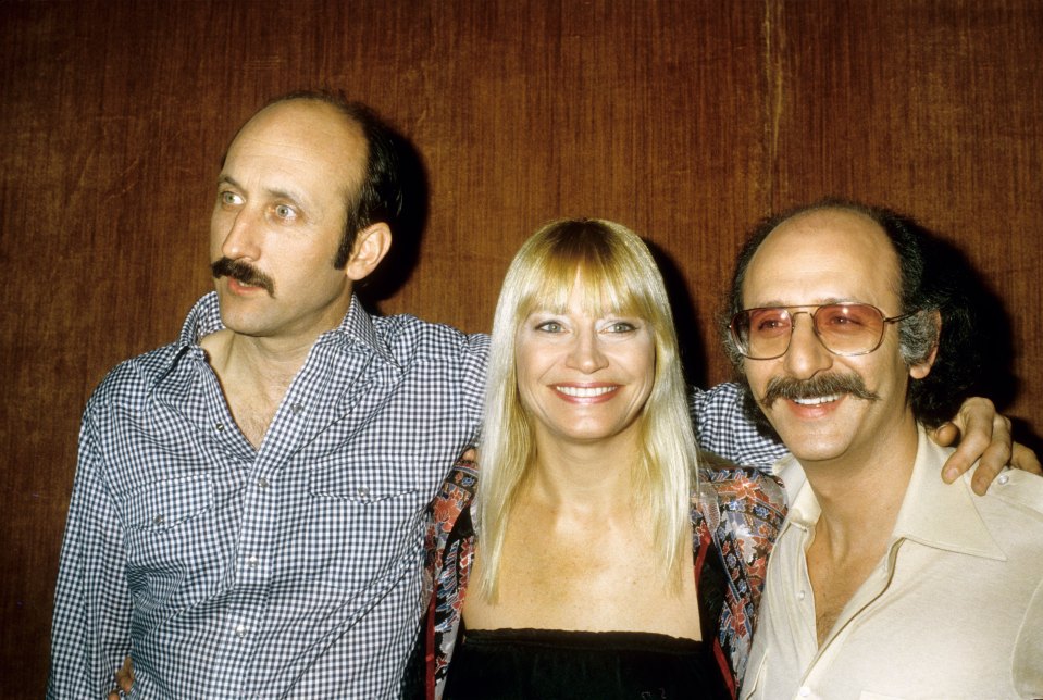 Noel ‘Paul’ Stookey, Mary Travers, and Peter Yarrow of Peter, Paul and Mary share a laugh circa the early-1980s