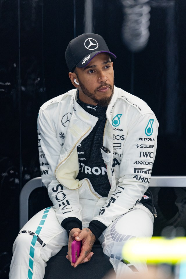 Lewis Hamilton in Mercedes team attire.