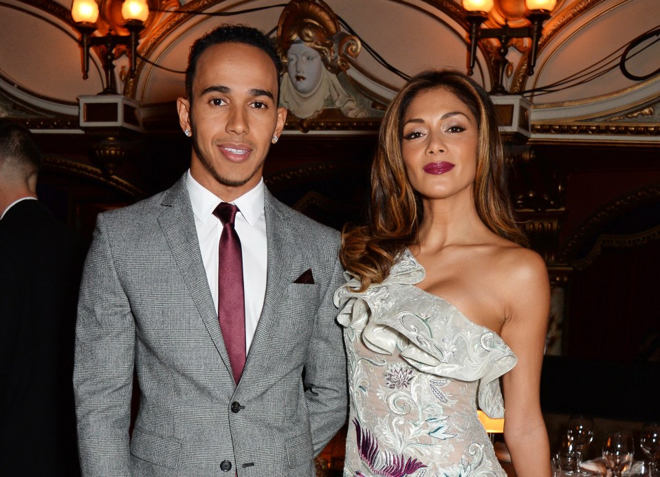 Lewis Hamilton and Nicole Scherzinger at a drinks reception.