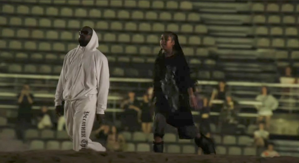 Kanye West and his daughter at a livestream performance in Seoul.