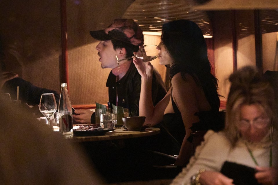 Timothée Chalamet and Kylie Jenner at a restaurant.