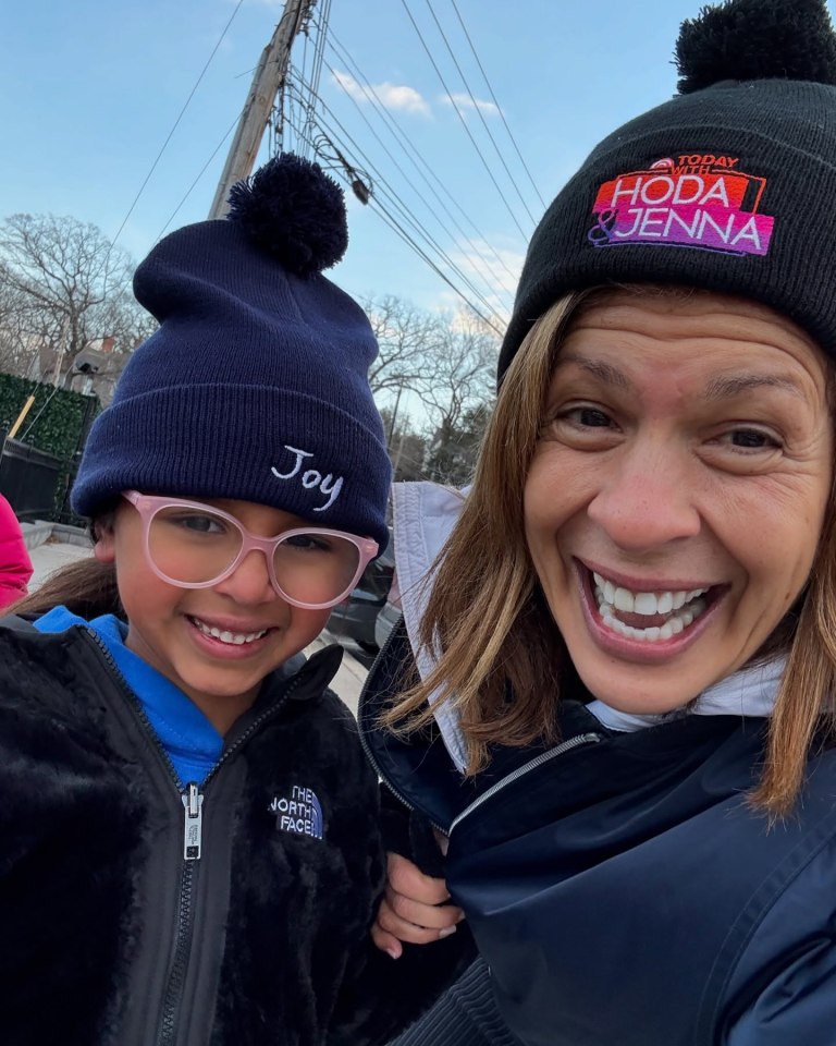 Hoda Kotb and her daughter wearing winter hats.