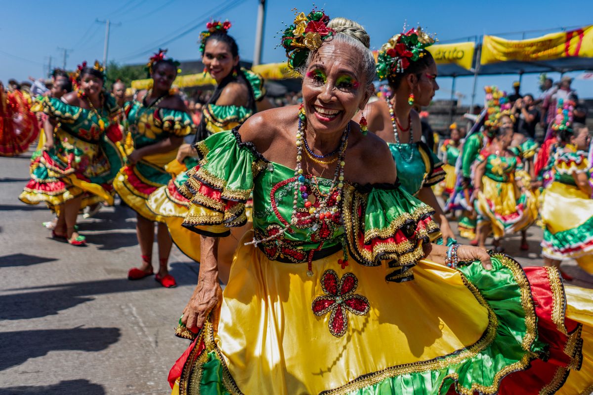 A reveler performs during the Batalla de Flores parade in the framework of the Barranquilla Carnival in Barranquilla, Colombia on February 11, 2024. (Photo by Charlie CORDERO / AFP) (Photo by CHARLIE CORDERO/AFP via Getty Images)