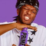 KSI holding a bottle of Prime Hydration.