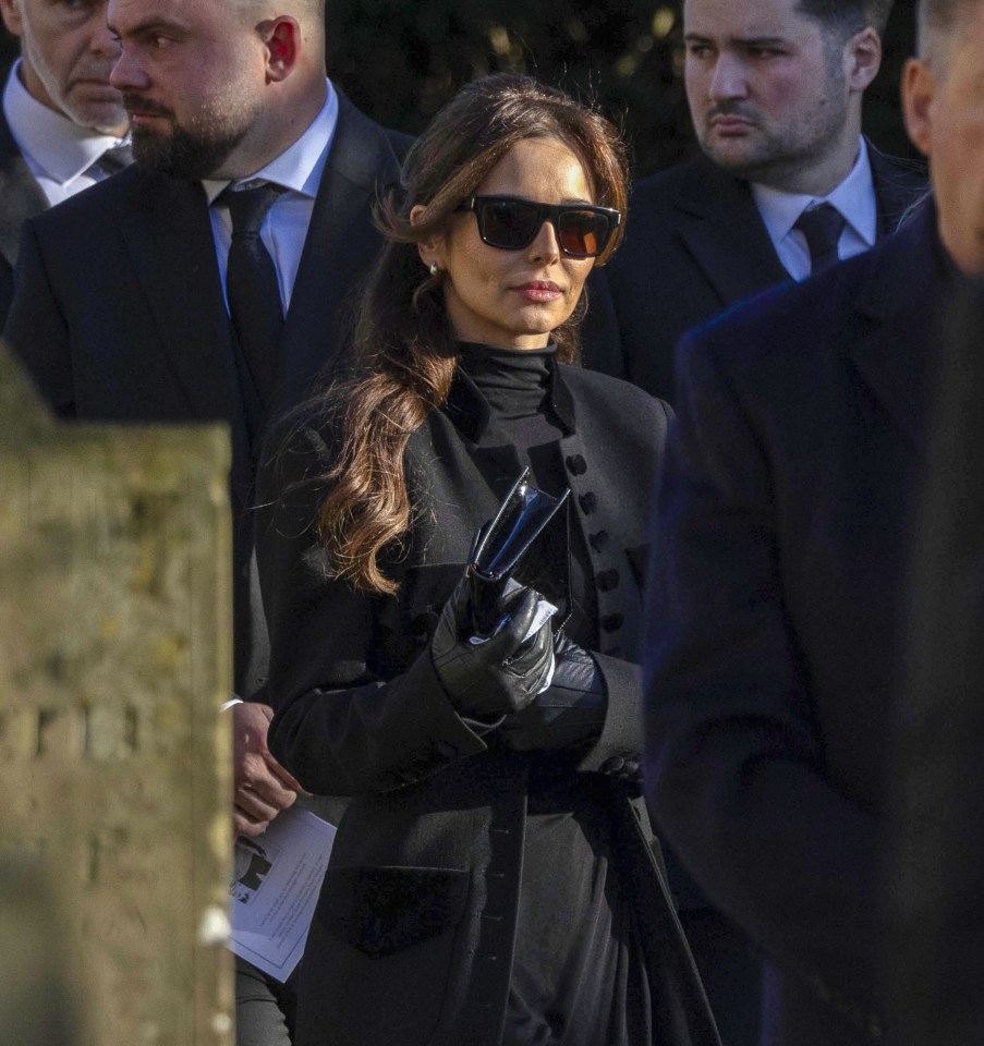 Cheryl leaving a funeral.