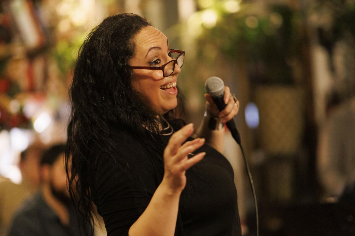 Carisa Bianca Mellado sings at Night Temple on Saturday, Dec. 21, 2024 in Los Angeles, CA. 