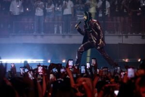 Bad Bunny on stage in Miami in May 2024. The Puerto Rican singer's latest album, Debí Tirar Más Fotos, topped Billboard's album chart this week.