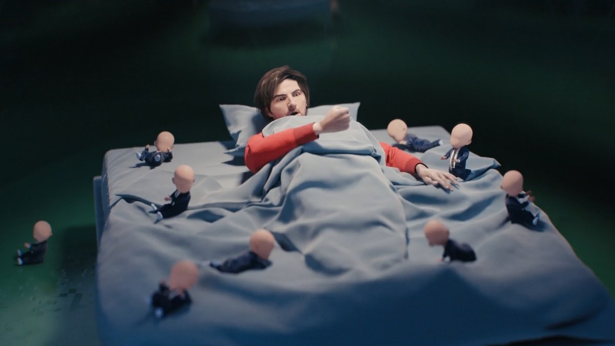 Mark in red pajamas with faceless babies in suiots crawling on his bed in the animated Severance season two opening credits