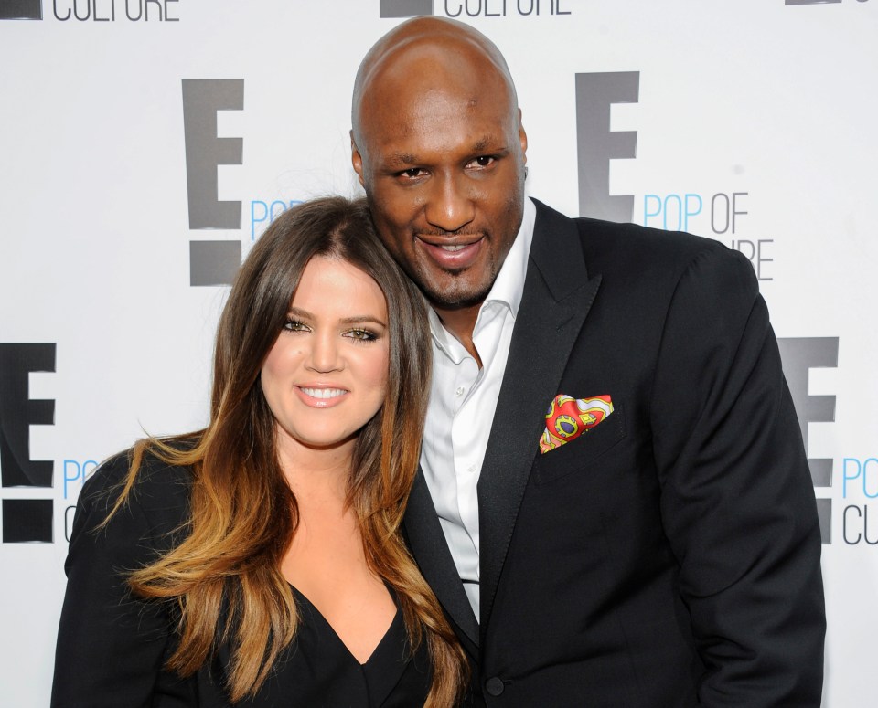 Khloe Kardashian and Lamar Odom at an E! Network event.