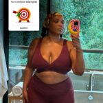 Lizzo in workout clothes, celebrating weight loss goals.