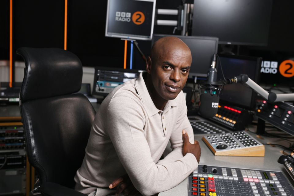 Trevor Nelson, BBC Radio 2 DJ, at his radio desk.