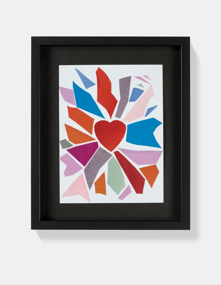 Framed collage of a red heart surrounded by multicolored shapes.