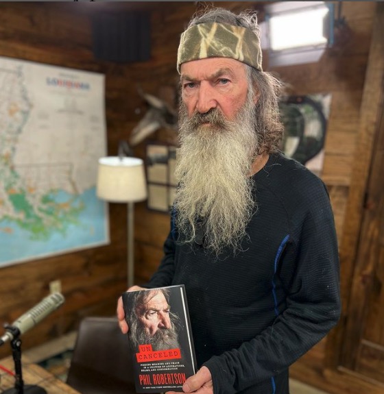 Phil Robertson holding his book, "Uncanceled."