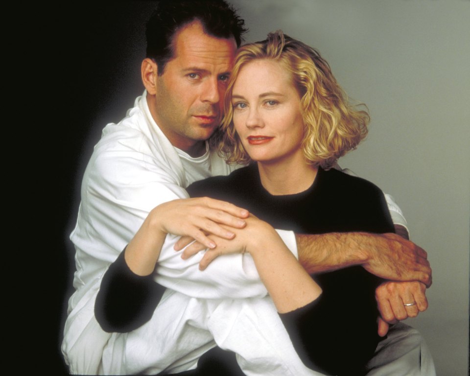 Bruce Willis and Cybill Shepherd in a promotional photo for *Moonlighting*.