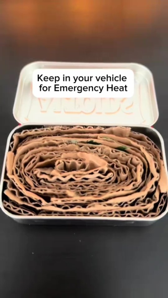 Cardboard layers in a tin for emergency vehicle heat.