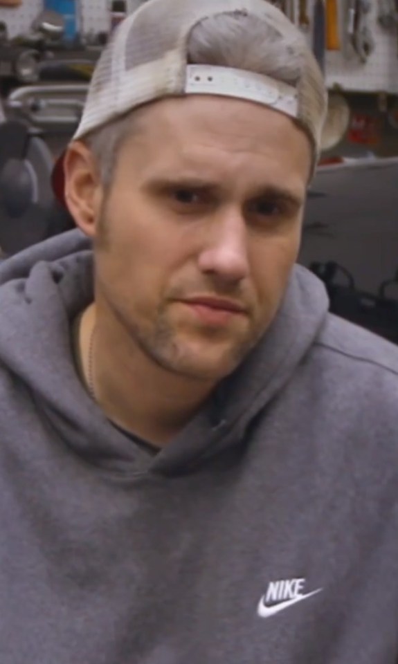 Ryan Edwards in a gray Nike hoodie.