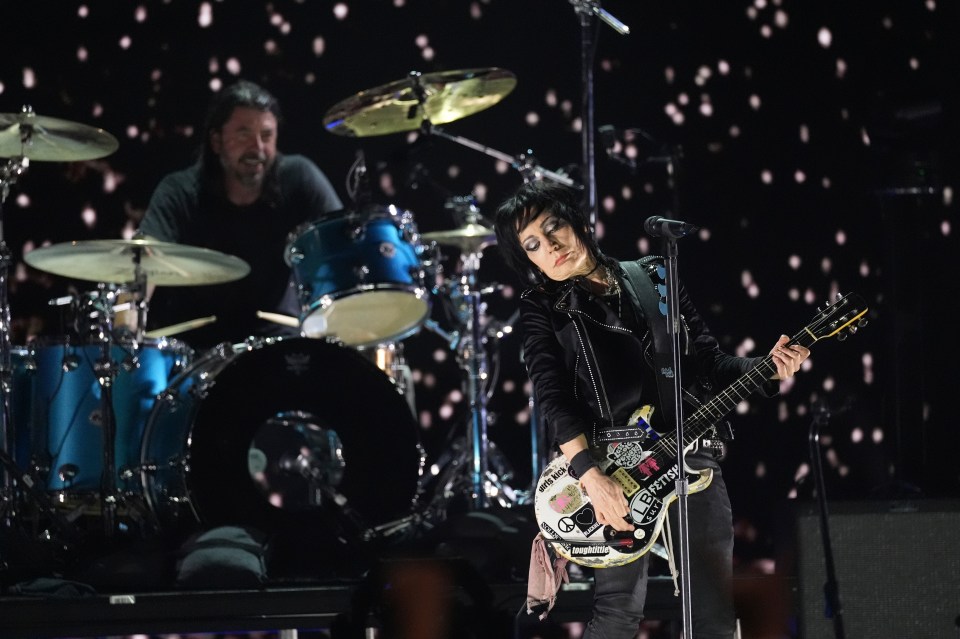 Joan Jett performing with Dave Grohl.